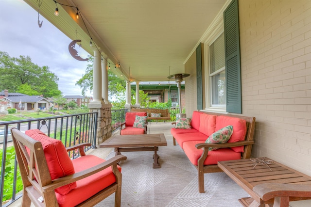 view of patio with covered porch and outdoor lounge area