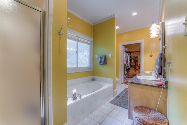 bathroom featuring crown molding, a garden tub, vanity, tile patterned floors, and a shower stall