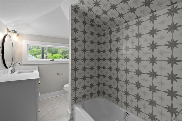 bathroom with vanity, baseboards, toilet, and marble finish floor