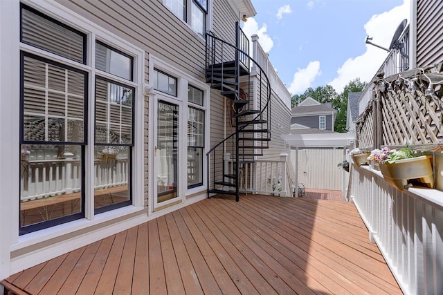wooden deck featuring stairs