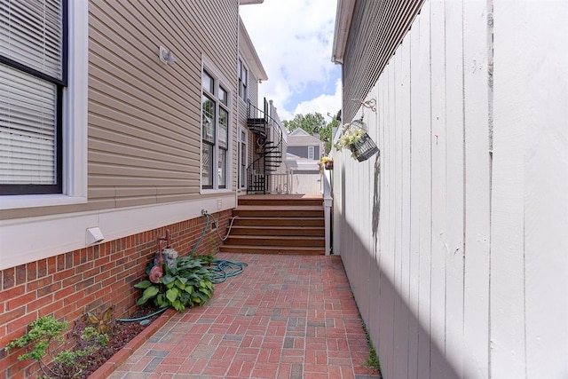 view of home's exterior with stairway