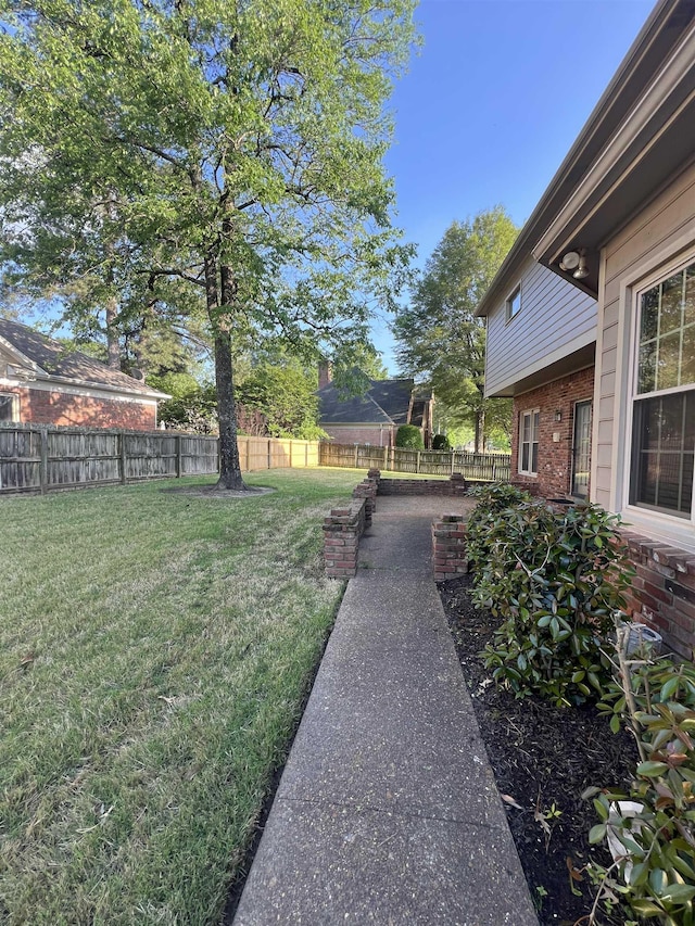 view of yard featuring a fenced backyard