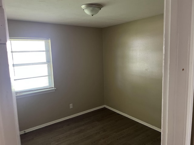 2997 Atmore St, Memphis, TN 38118 - unfurnished room featuring baseboards and dark wood finished floors