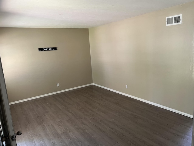 2997 Atmore St, Memphis, TN 38118 - empty room featuring baseboards, dark wood-style flooring, and visible vents