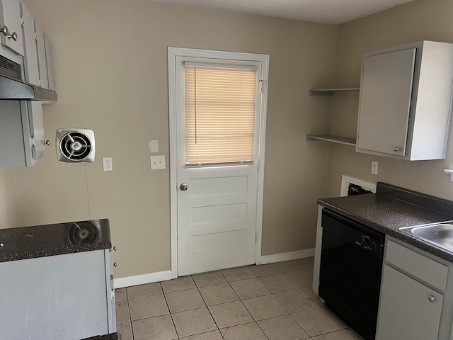 2997 Atmore St, Memphis, TN 38118 - kitchen with open shelves, dishwasher, light tile patterned floors, baseboards, and dark countertops