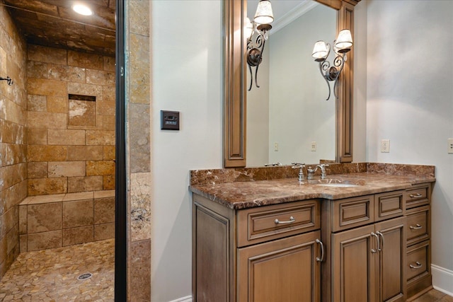 75 Notting Creek Cv, Eads, TN 38028 - bathroom with baseboards, tiled shower, and vanity