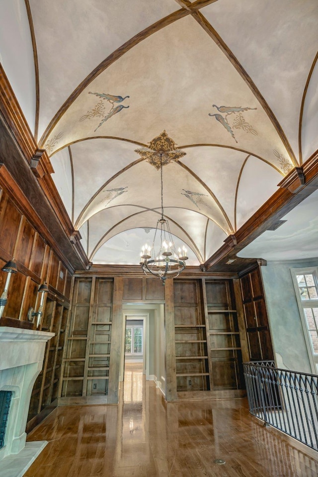 75 Notting Creek Cv, Eads, TN 38028 - interior space with a notable chandelier and a fireplace with raised hearth