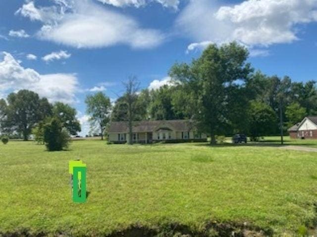 283 Brierhedge Rd, Covington, TN 38019 - surrounding community featuring a yard