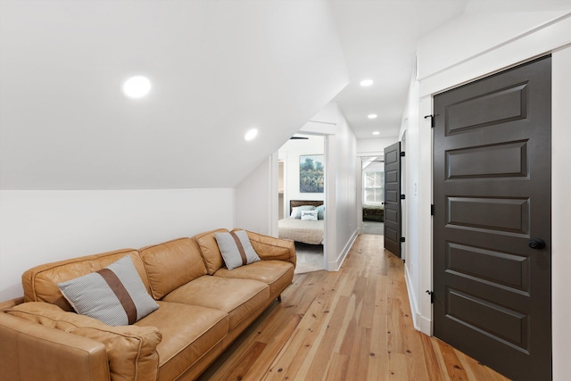 bedroom featuring light wood-type flooring and recessed lighting