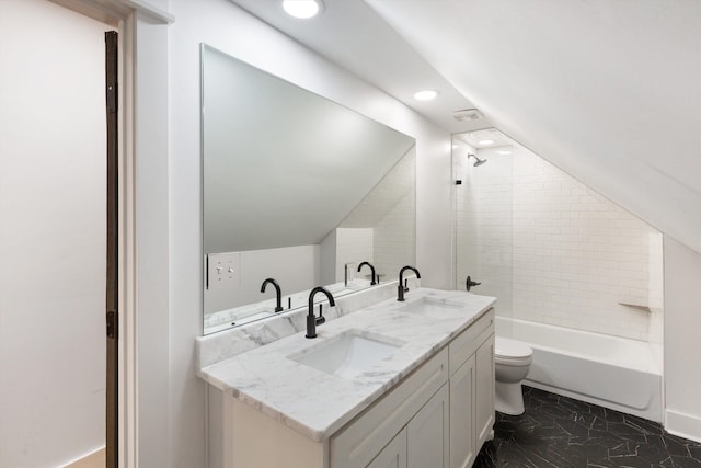 full bath featuring recessed lighting, double vanity, toilet, and a sink