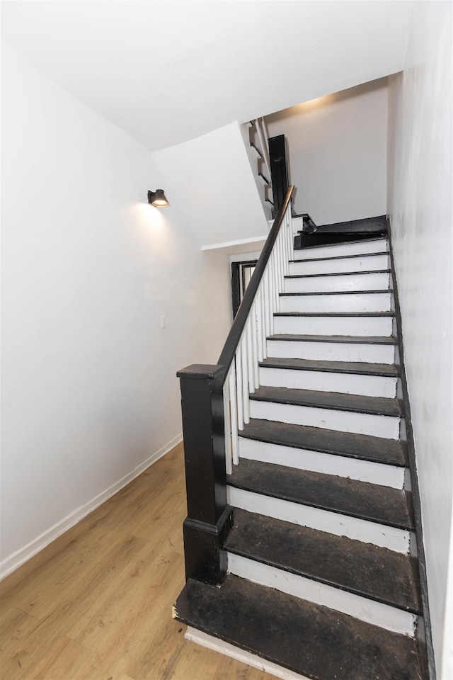 993 Oakview St, Memphis, TN 38114 - stairway with baseboards and wood finished floors