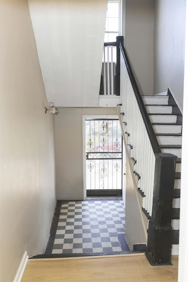 993 Oakview St, Memphis, TN 38114 - stairs with a wealth of natural light and wood finished floors