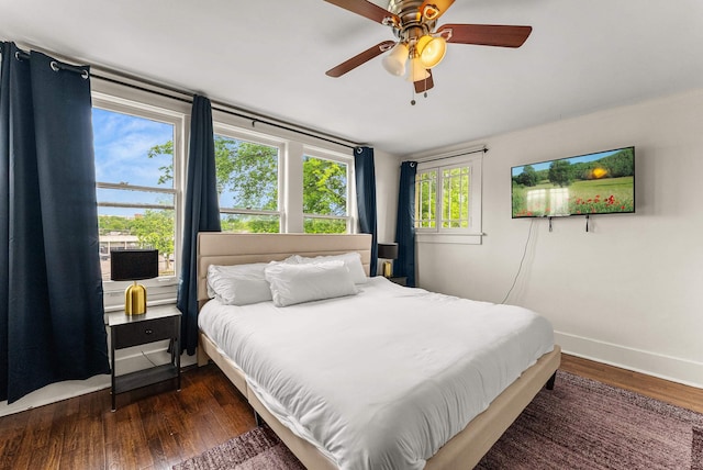 158 N Willett St, Memphis, TN 38104 - bedroom with dark wood finished floors, baseboards, and ceiling fan