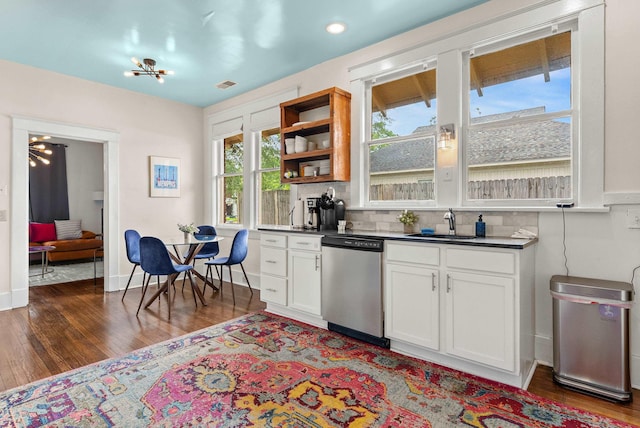 158 N Willett St, Memphis, TN 38104 - kitchen with open shelves, wood finished floors, a sink, and dishwasher