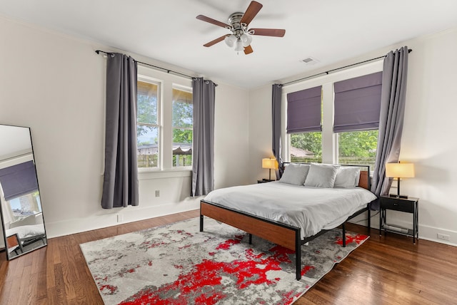 158 N Willett St, Memphis, TN 38104 - bedroom featuring wood finished floors, visible vents, and multiple windows