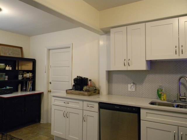 496 Eastern Dr SW, Memphis, TN 38122 - kitchen with a sink, backsplash, white cabinets, and dishwasher