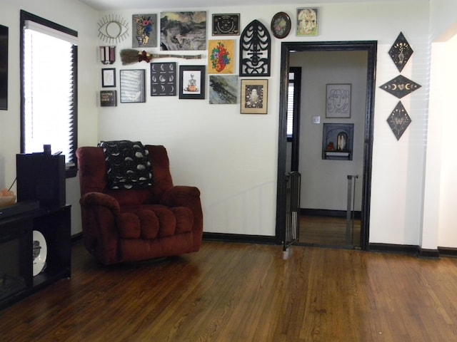 496 Eastern Dr SW, Memphis, TN 38122 - living area featuring baseboards and wood finished floors