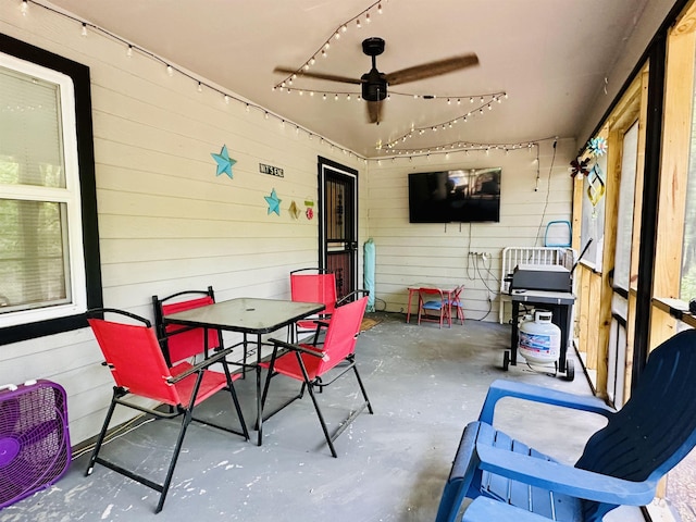 view of patio / terrace featuring outdoor dining area and ceiling fan
