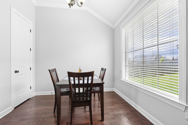 dining space featuring crown molding, lofted ceiling, baseboards, and dark wood-style floors
