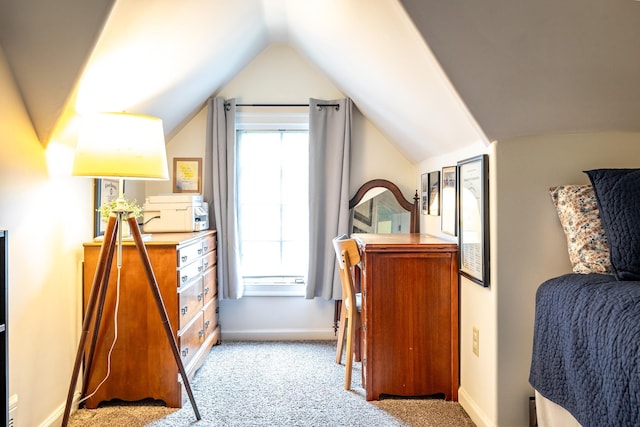 1851 Walker Ave, Memphis, TN 38114 - bedroom with light colored carpet, vaulted ceiling, and baseboards