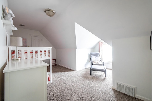 1851 Walker Ave, Memphis, TN 38114 - carpeted bedroom with lofted ceiling, baseboards, and visible vents