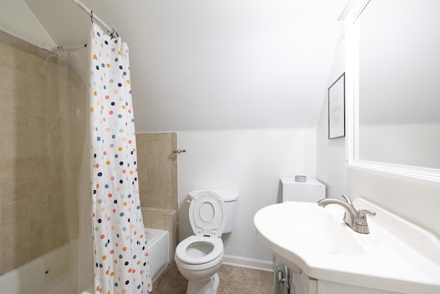 1851 Walker Ave, Memphis, TN 38114 - full bathroom featuring toilet, baseboards, shower / bathtub combination with curtain, tile patterned floors, and vaulted ceiling