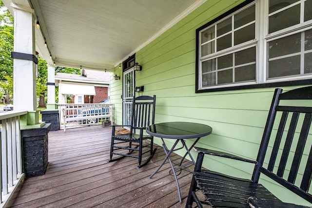 1851 Walker Ave, Memphis, TN 38114 - wooden terrace featuring a porch
