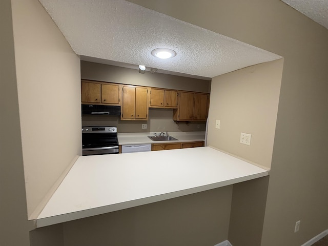 kitchen featuring a textured ceiling, dishwasher, range hood, a peninsula, and electric range