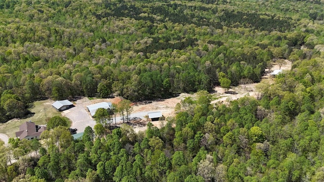 aerial view featuring a view of trees