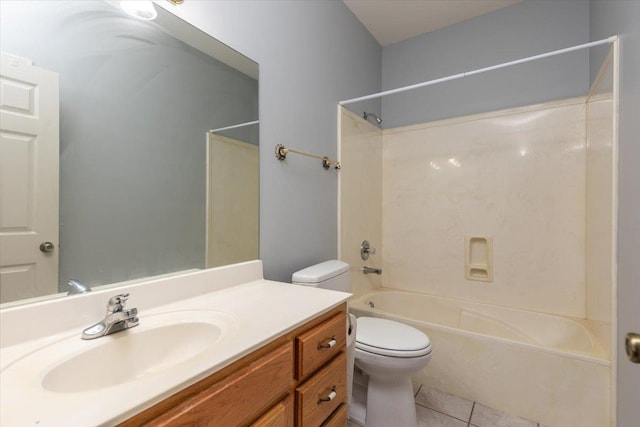 bathroom with tile patterned flooring, toilet, bathtub / shower combination, and vanity