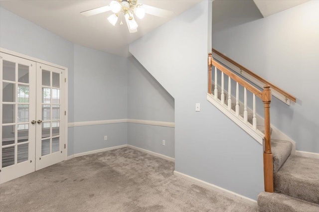 interior space featuring stairway, french doors, baseboards, and ceiling fan