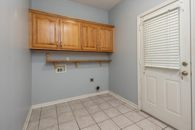 washroom featuring cabinet space, light tile patterned floors, electric dryer hookup, baseboards, and hookup for a washing machine