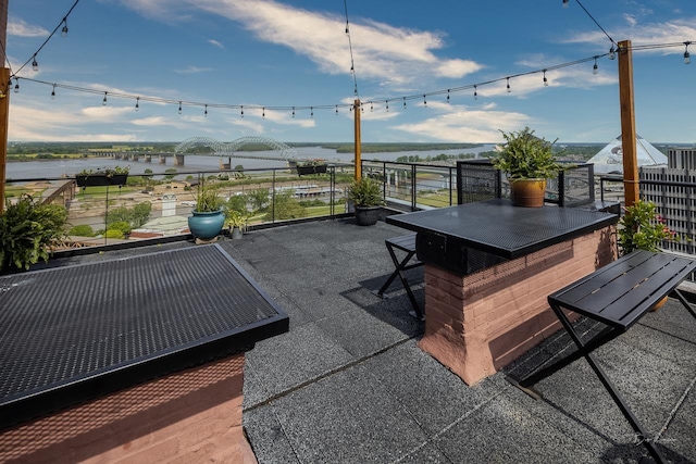 view of patio / terrace featuring a water view