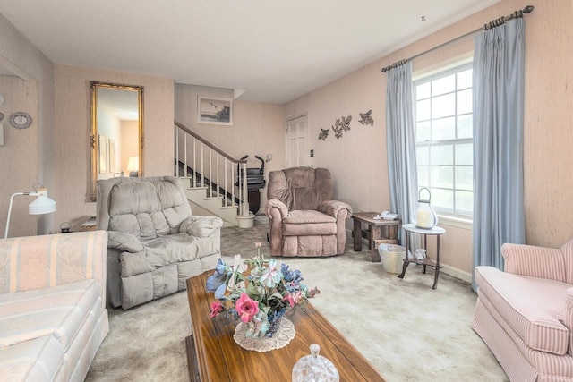5676 Quince Rd Unit 7, Memphis, TN 38119 - living area with light colored carpet, a wealth of natural light, and stairs