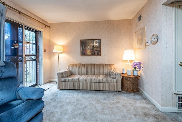 5676 Quince Rd Unit 7, Memphis, TN 38119 - living area with carpet flooring, visible vents, and baseboards