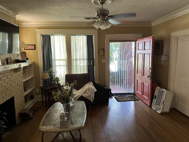 945 Faxon St, Memphis, TN 38105 - interior space featuring ornamental molding, a textured ceiling, dark wood-type flooring, and a ceiling fan