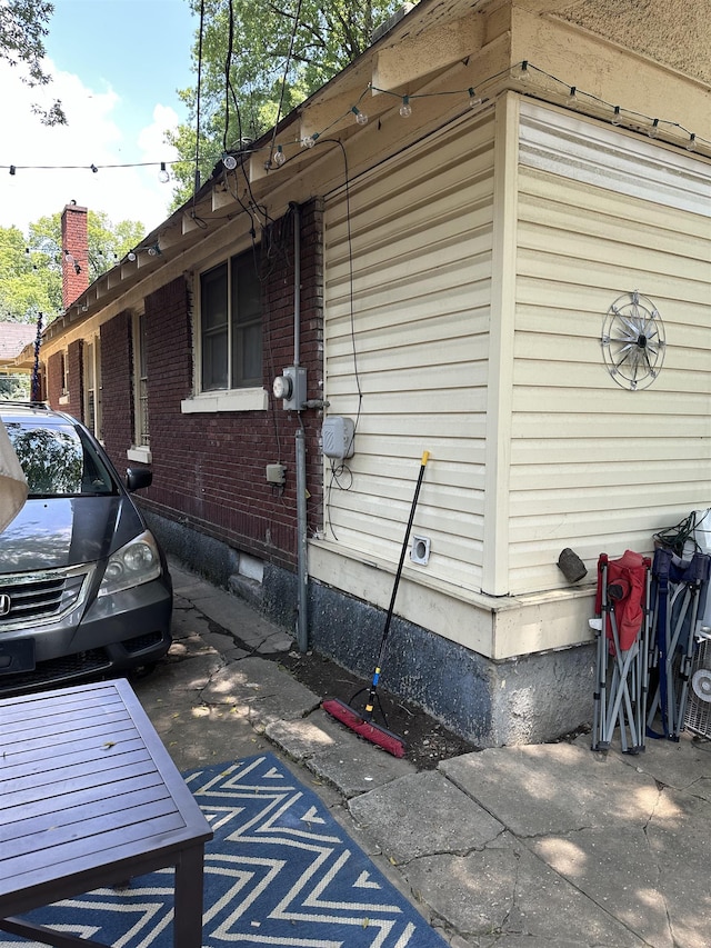 945 Faxon St, Memphis, TN 38105 - view of home's exterior featuring brick siding