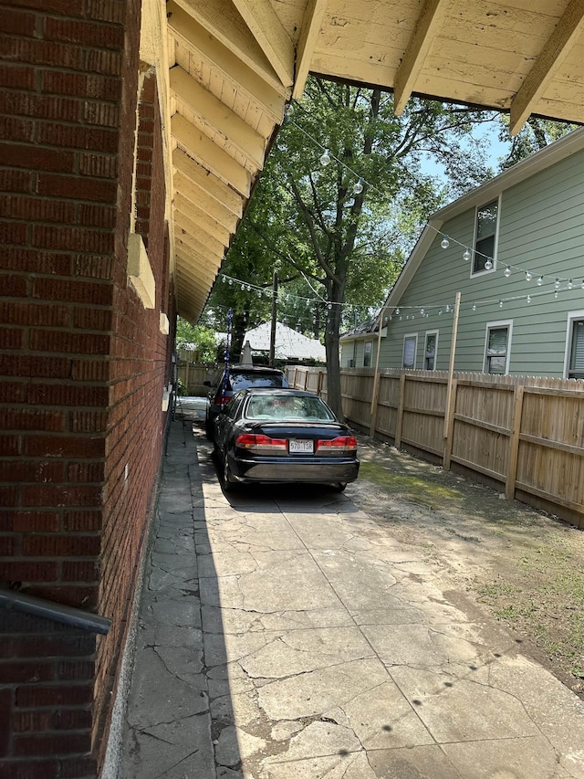 945 Faxon St, Memphis, TN 38105 - view of vehicle parking with fence