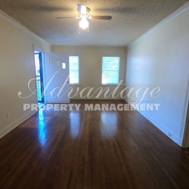 unfurnished room with crown molding, a textured ceiling, wood finished floors, ceiling fan, and baseboards