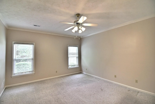 1599 John Ridge Dr, Collierville, TN 38017 - unfurnished room featuring healthy amount of natural light, baseboards, light colored carpet, ornamental molding, and a textured ceiling
