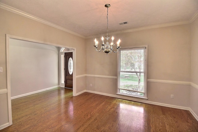 1599 John Ridge Dr, Collierville, TN 38017 - empty room with a chandelier, wood finished floors, ornamental molding, and baseboards
