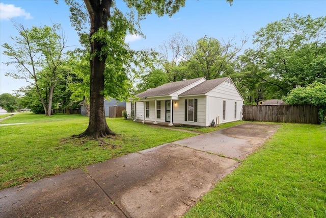 ranch-style house with concrete driveway