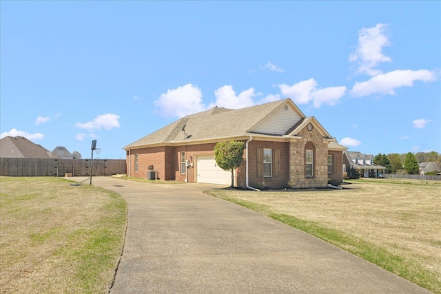 view of front facade with an attached garage, concrete driveway, brick siding, and central AC unit