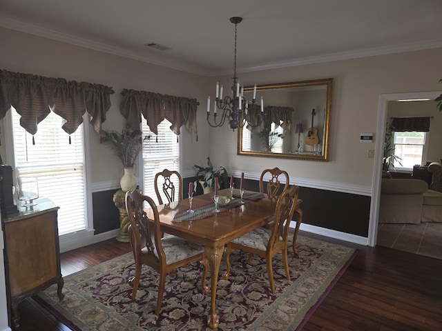 732 Catesby Cv, Collierville, TN 38017 - dining space with a chandelier, ornamental molding, wood finished floors, healthy amount of natural light, and baseboards