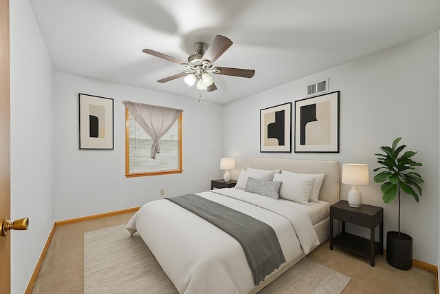 1844 Myrna Ln, Memphis, TN 38117 - bedroom with light colored carpet, baseboards, and ceiling fan