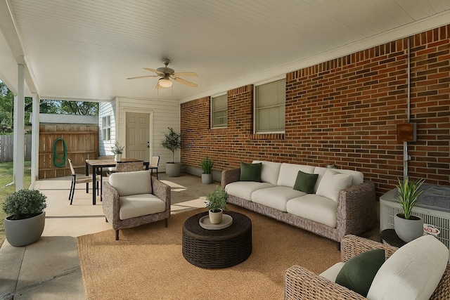 1844 Myrna Ln, Memphis, TN 38117 - view of patio featuring a ceiling fan, an outdoor hangout area, outdoor dining space, and fence