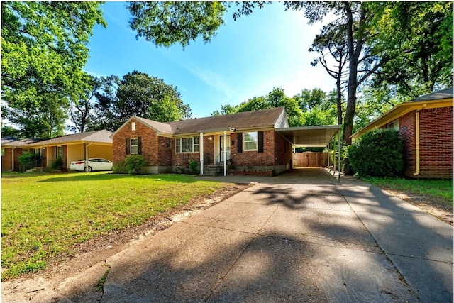 1844 Myrna Ln, Memphis, TN 38117 - ranch-style house with concrete driveway, a front lawn, brick siding, and a carport