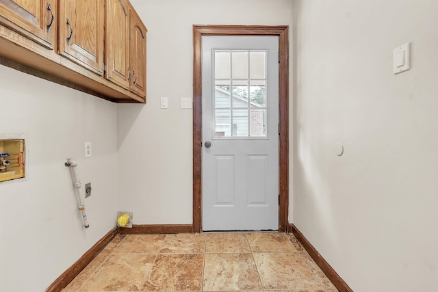 345 Locust Grove Grv, Memphis, TN 38018 - laundry area featuring cabinet space, hookup for an electric dryer, baseboards, and washer hookup