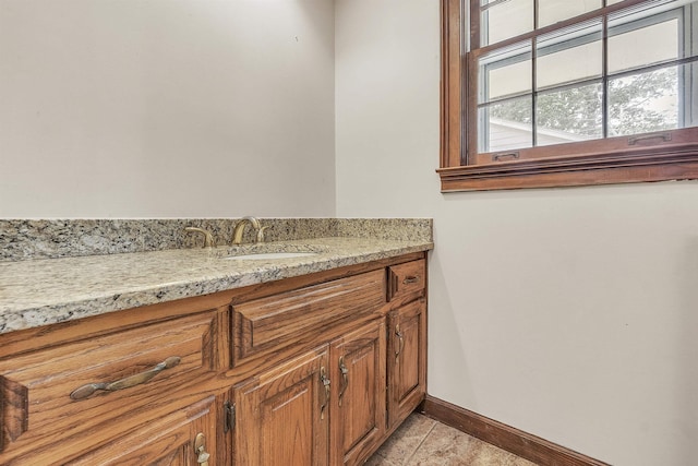 345 Locust Grove Grv, Memphis, TN 38018 - bathroom featuring baseboards and vanity