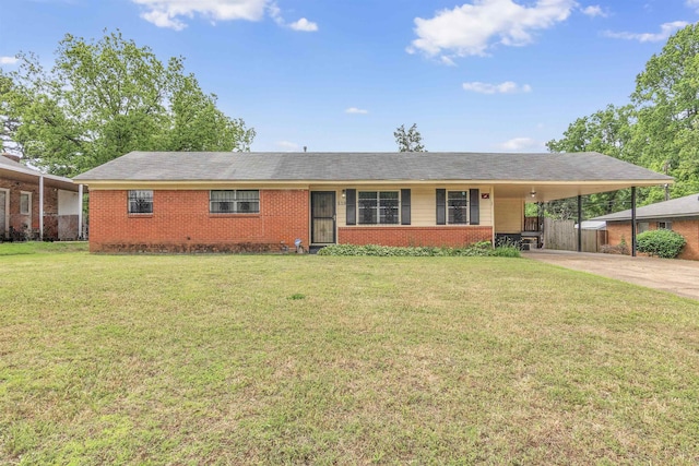 ranch-style home with brick siding, concrete driveway, and a carport
